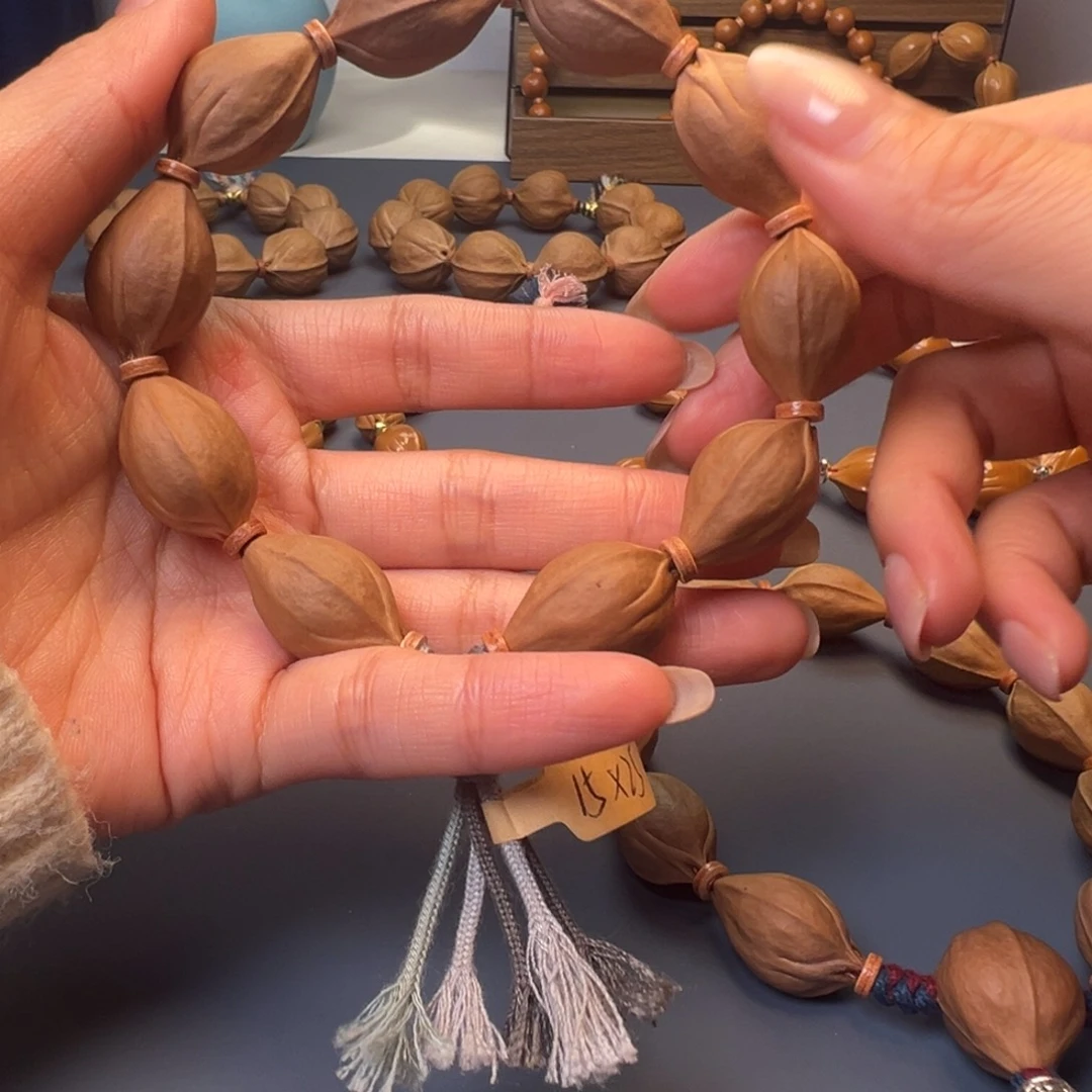 都***别橄榄核手串梅林铁核三面佛 15×25 去霜