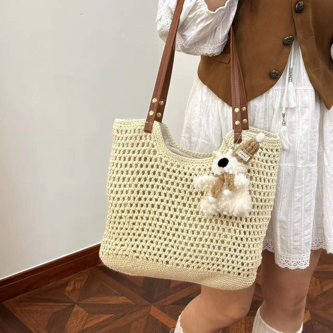 2025春夏新款大容量简约棉线编织包镂空网纹托特包海边度假沙滩包