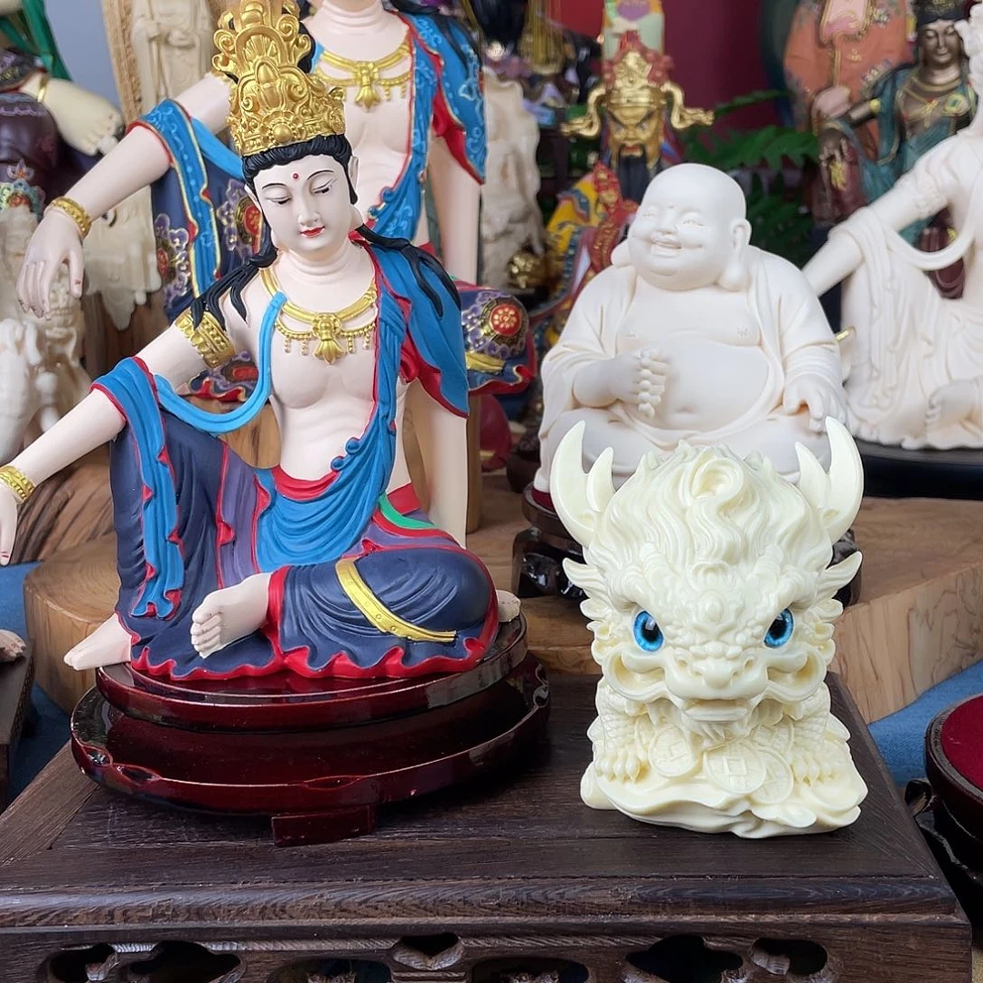 冷***.石材自在观音弥勒麒麟摆件