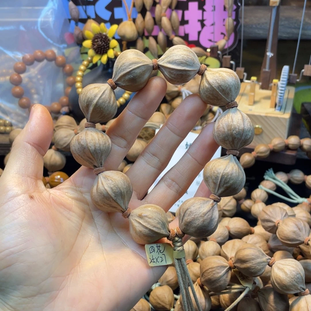 T***t橄榄核吊坠2527四花铁核