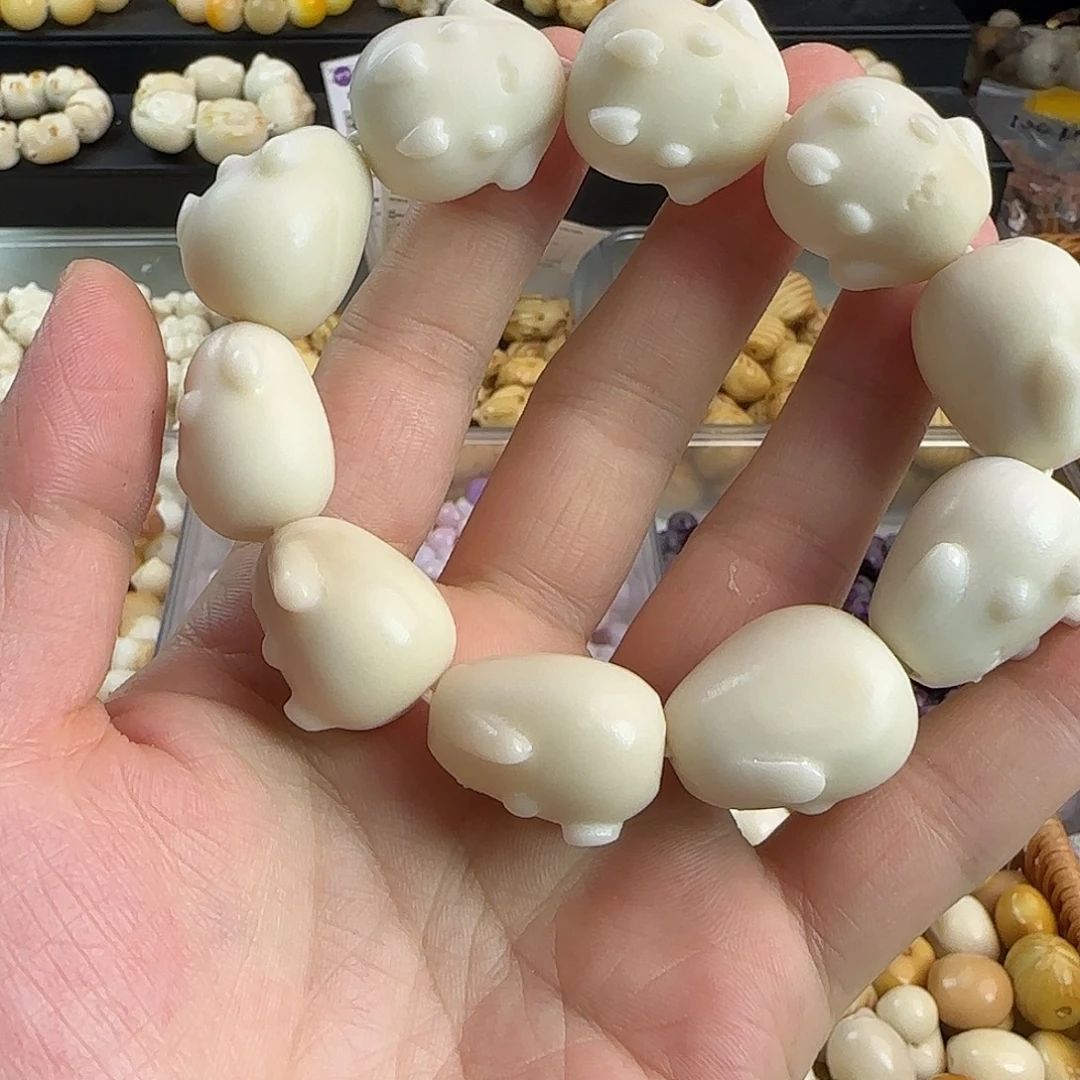 吊坠菩提根/象牙果微瑕疵白色布丁狗手串一条