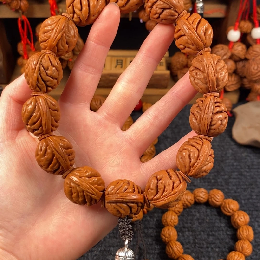 吊坠桃核桃枭手串