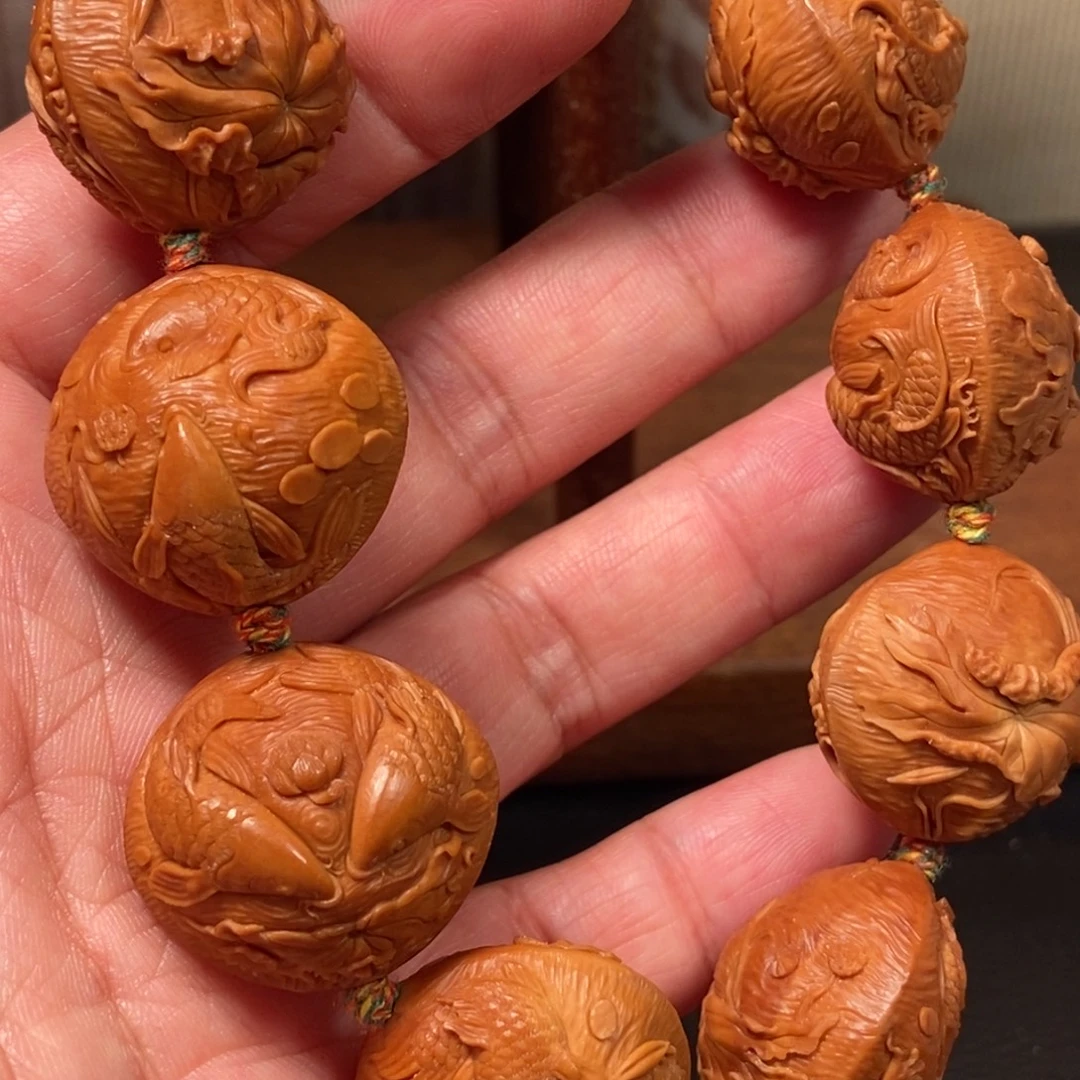 星****橄榄核手串/手链2.6双鱼戏莲