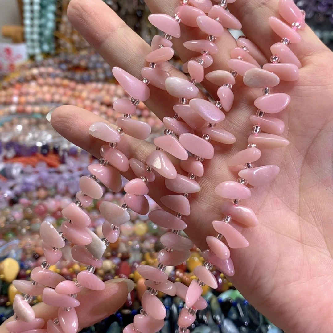 未镶嵌玛瑙/玉髓珠宝半成品粉奥宝长牙一条