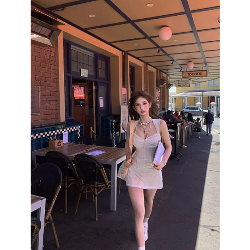 苏黎甜薇 复古镂空刺绣V领连衣裙女收腰显瘦a字短裙春季