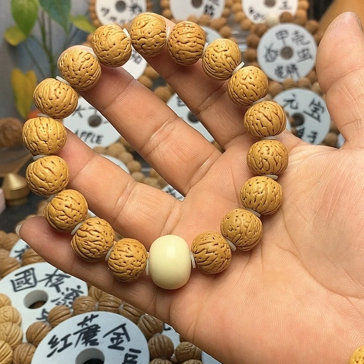 【闪购商品】在****宏桃核手串元宝手串