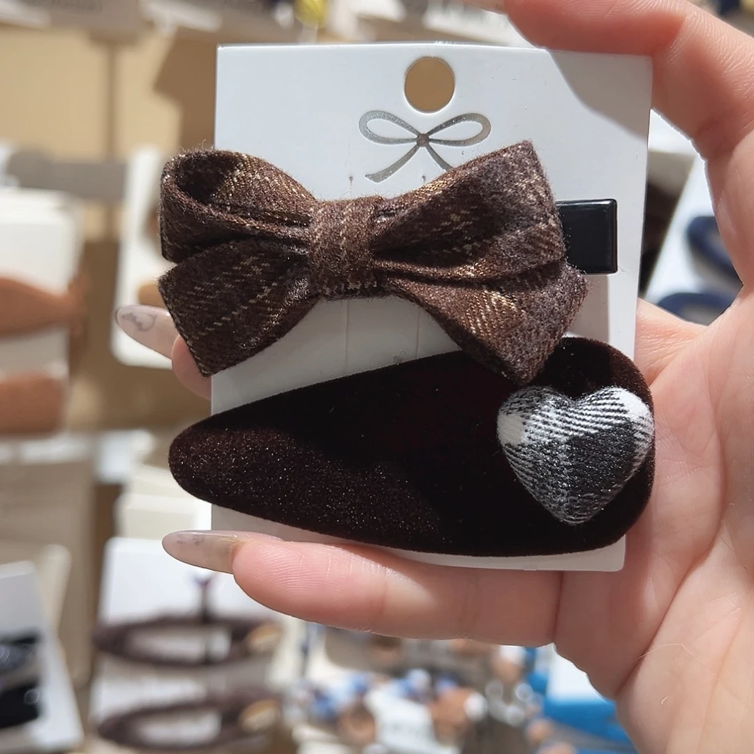 皮质铁合金咖色蝴蝶结对夹