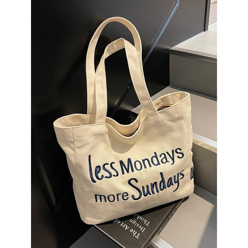 韩版小众通勤刺绣帆布包包2025新款妈咪托特家庭日用必备品垃圾袋