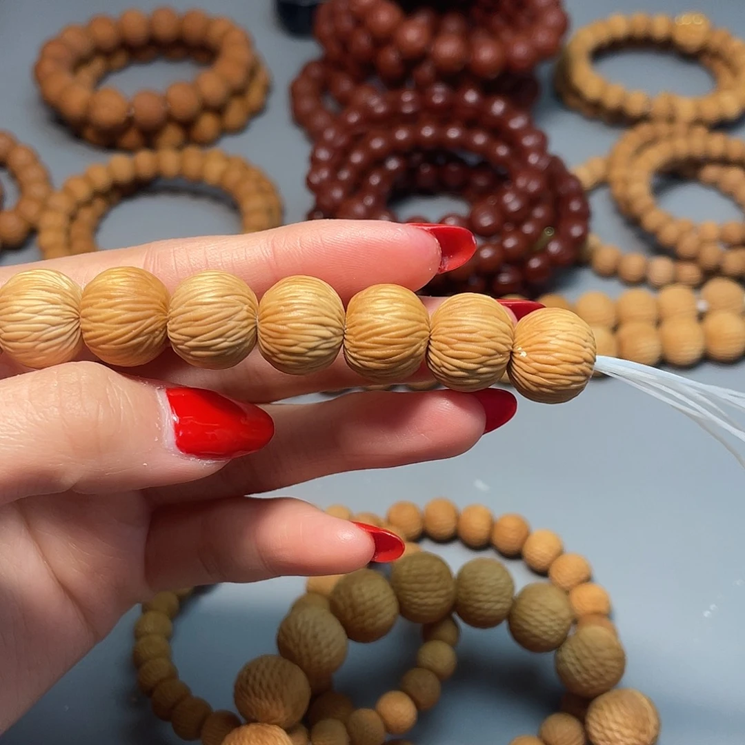 坚***斗猴头核桃把件金丝