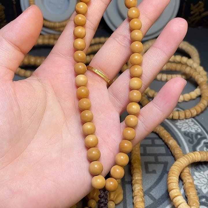 龙眼菩提吊坠U**^龙脊菩提圆手持36颗8mm
