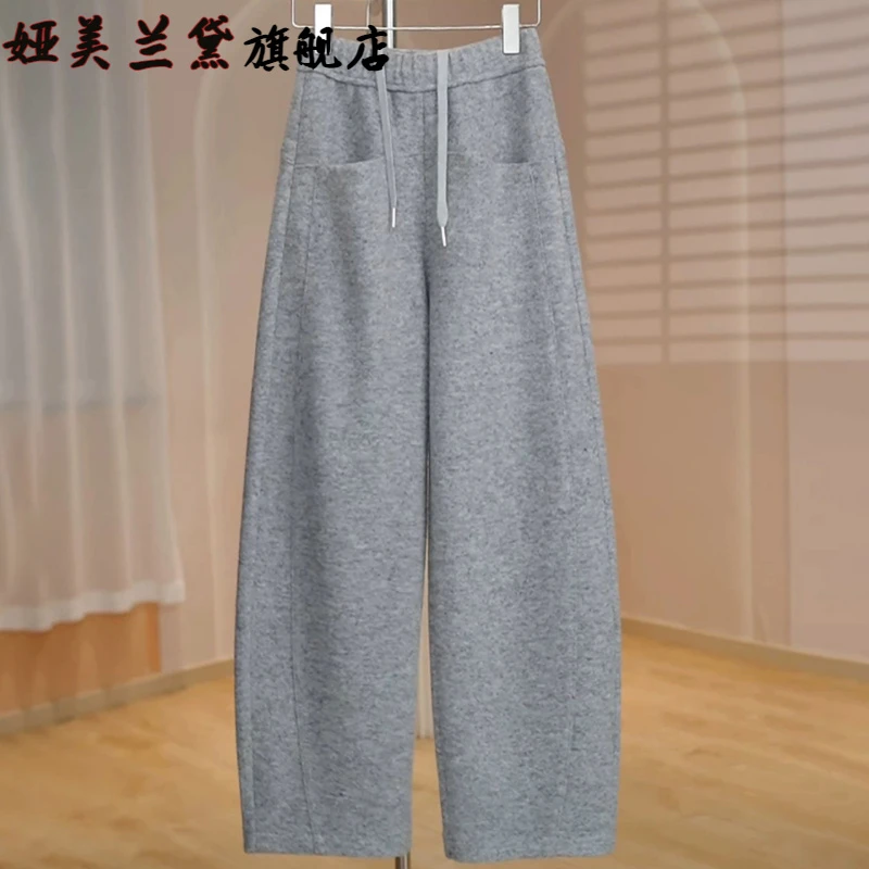 羊毛呢弯刀阔腿裤女2025秋冬季新款今年流行浅灰加绒加厚休闲裤子