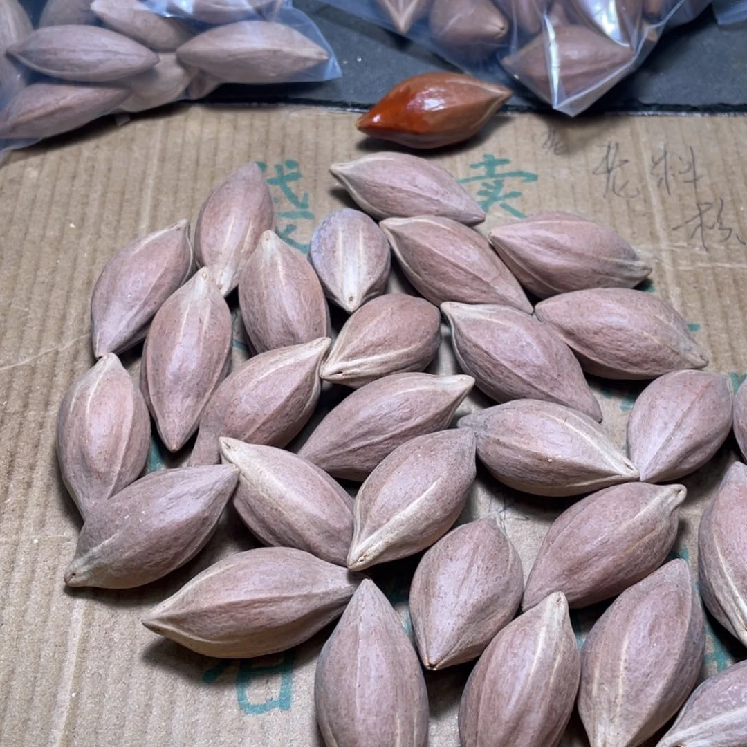 且***看橄榄核吊坠不退不换