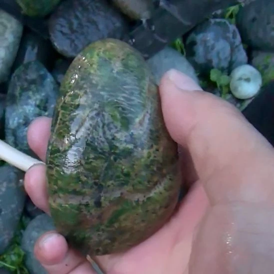 乐***谜菱锰矿（红纹石）合金西藏藏玉