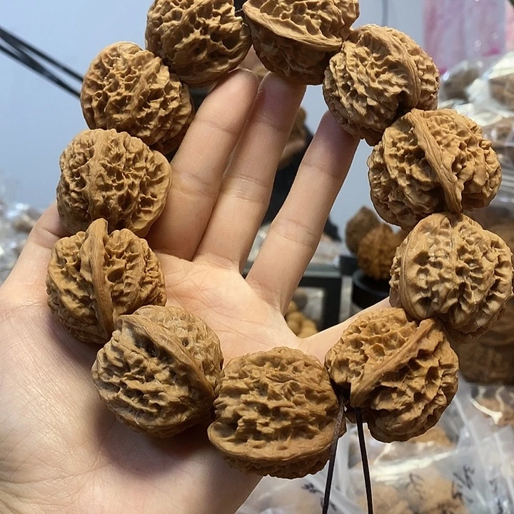 文玩核桃把件38野牛手持