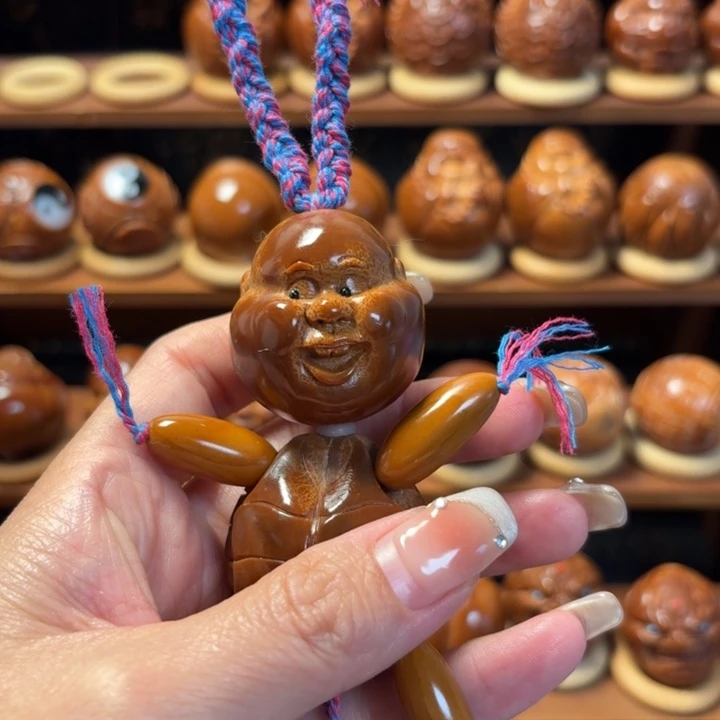 薇****大叶紫檀（黑酸枝木类）巴西橄榄核雕工艺品