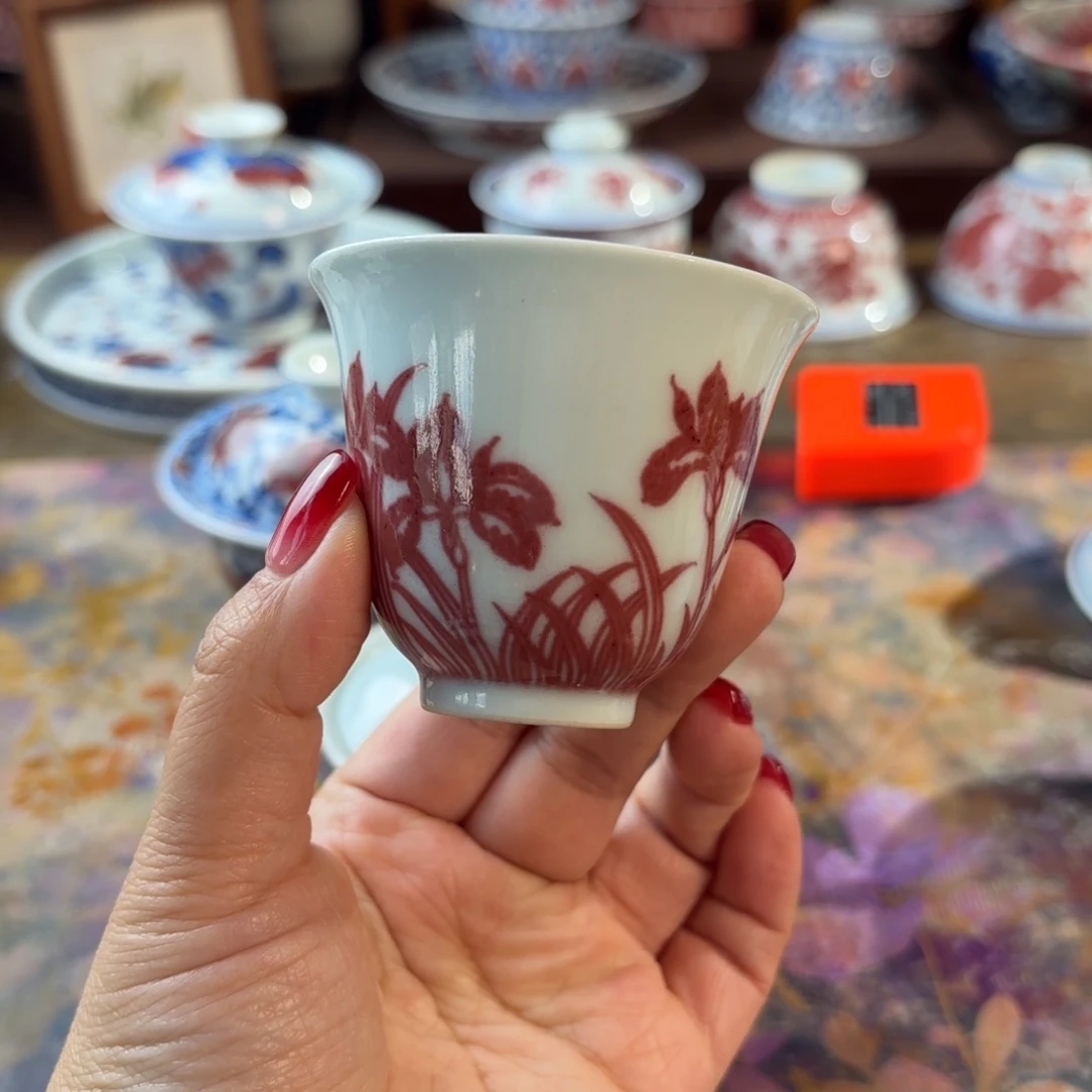 瓷青花釉里红兰花铃铛杯