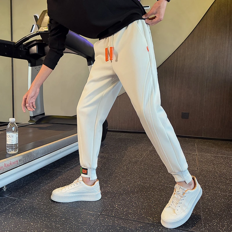 网红卫裤男春秋季潮流高级感运动小脚九分冬装男士休闲百搭长裤子