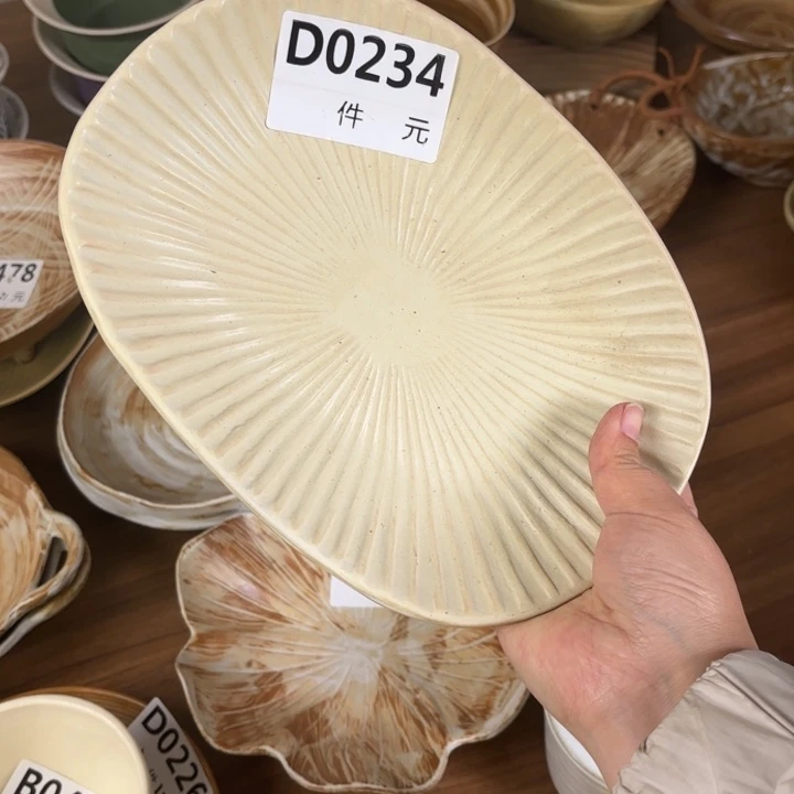 瓷234粗陶浮雕异形盘