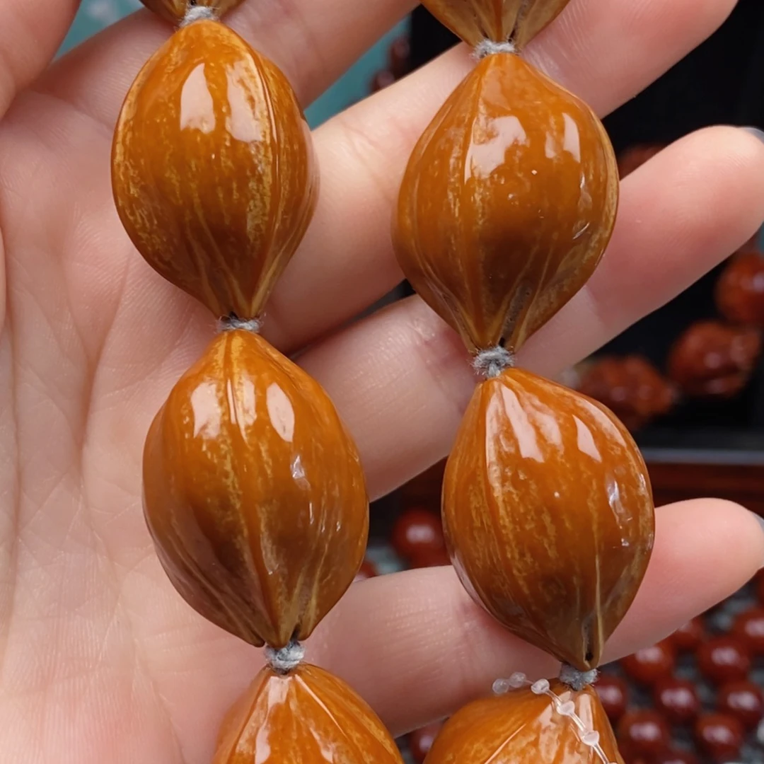 橄榄核吊坠光***事橄榄核