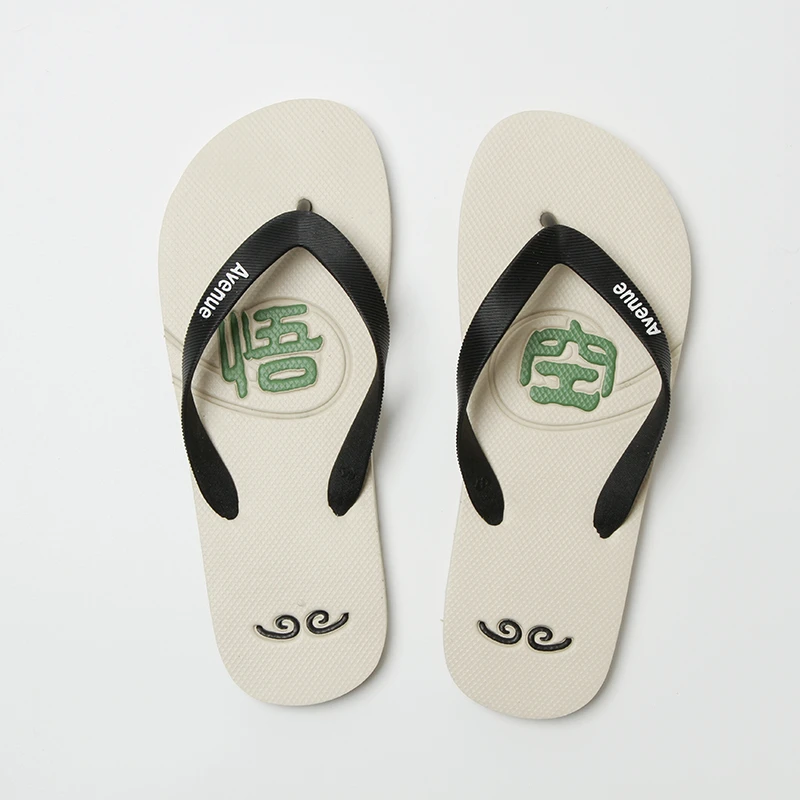 沙滩人字拖轻便春秋防滑图腾平跟夏季人字拖男鞋印花情侣黑色