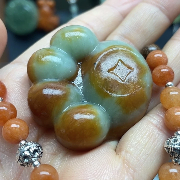 未镶嵌蛇纹石玉颈饰瓜*宝