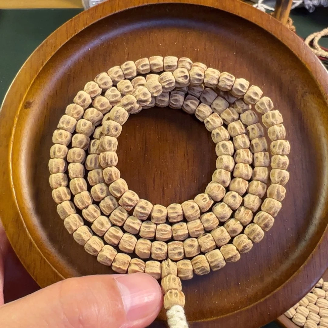 【闪购商品】柏香籽/百香籽吊坠热振双坑对眼狮驼林6.6尺寸