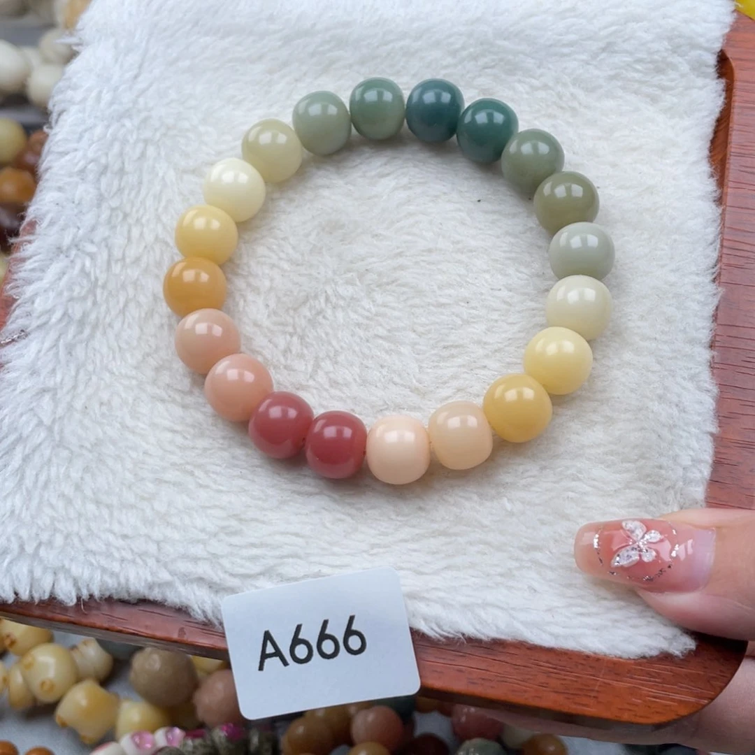 菩提根/象牙果手串瑕A666彩虹糖手串随机一串12mm桶珠