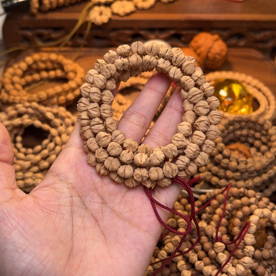 喜***睛柏香籽/百香籽吊坠