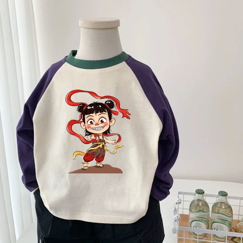 新款爆款儿童卡通哪吒长袖T恤纯棉男女童百搭春季宽松休闲潮t上衣