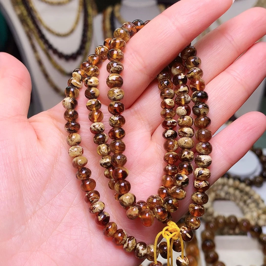 琥珀未镶嵌裸石6/血底瓷白溶洞108-70