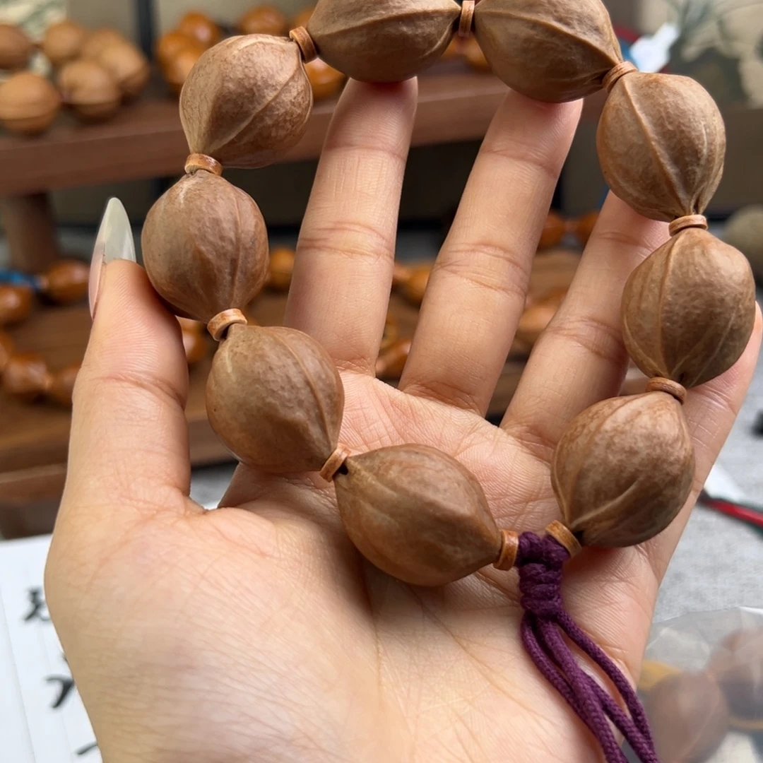 C***y手串橄榄核22/28三花梅林铁核