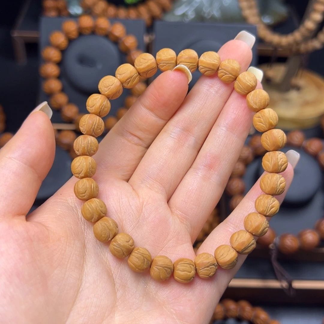 灰***驴手串桃核野生玉龙脊0.9