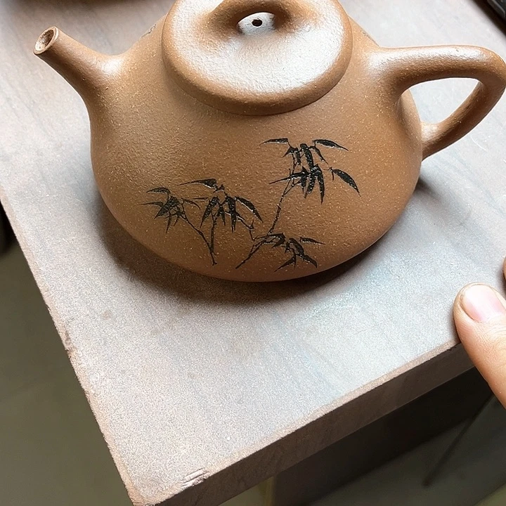 紫砂茶壶?**某瑕疵的子冶石瓢