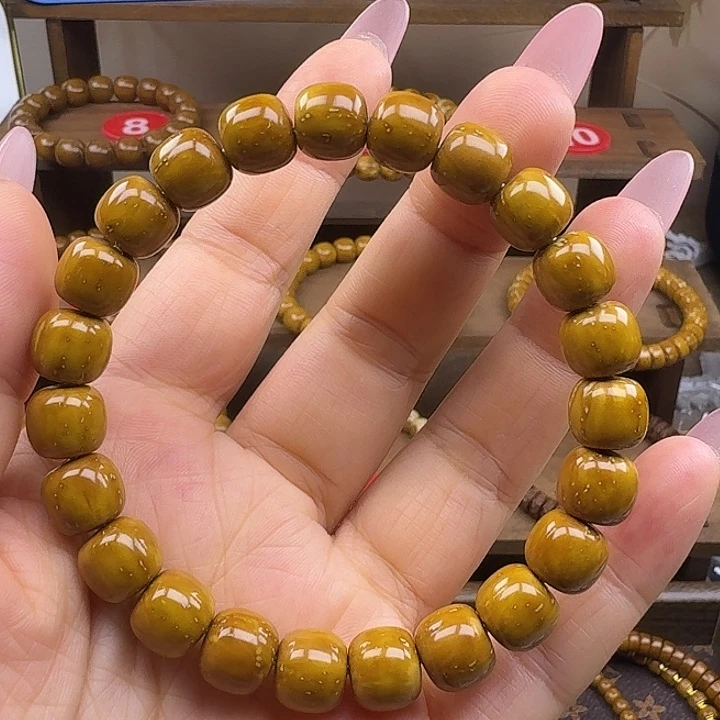 M****人紫金鼠黄皮实心手串