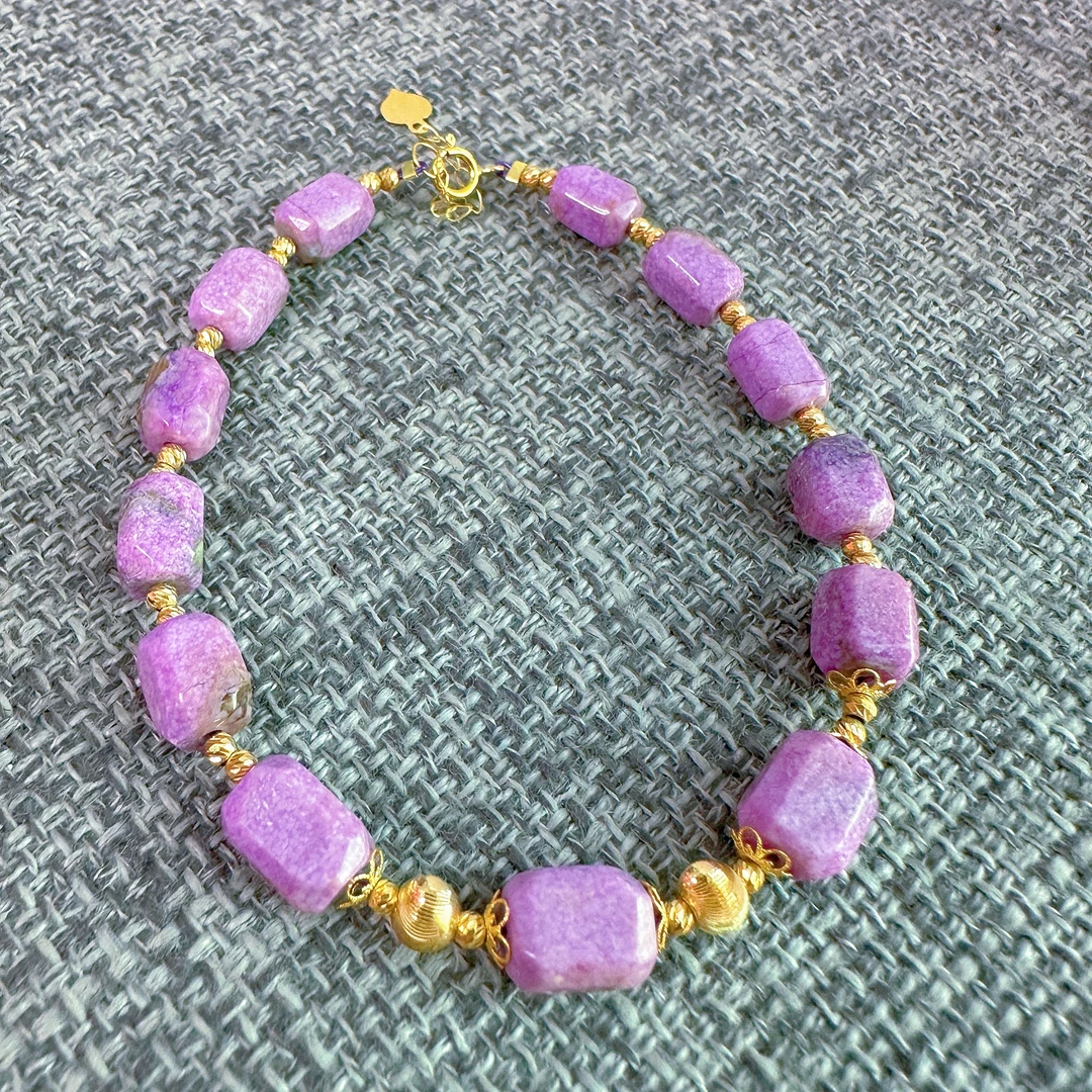 7142舒俱来樱花粉四棱猫眼珠18k金手链多样性发一