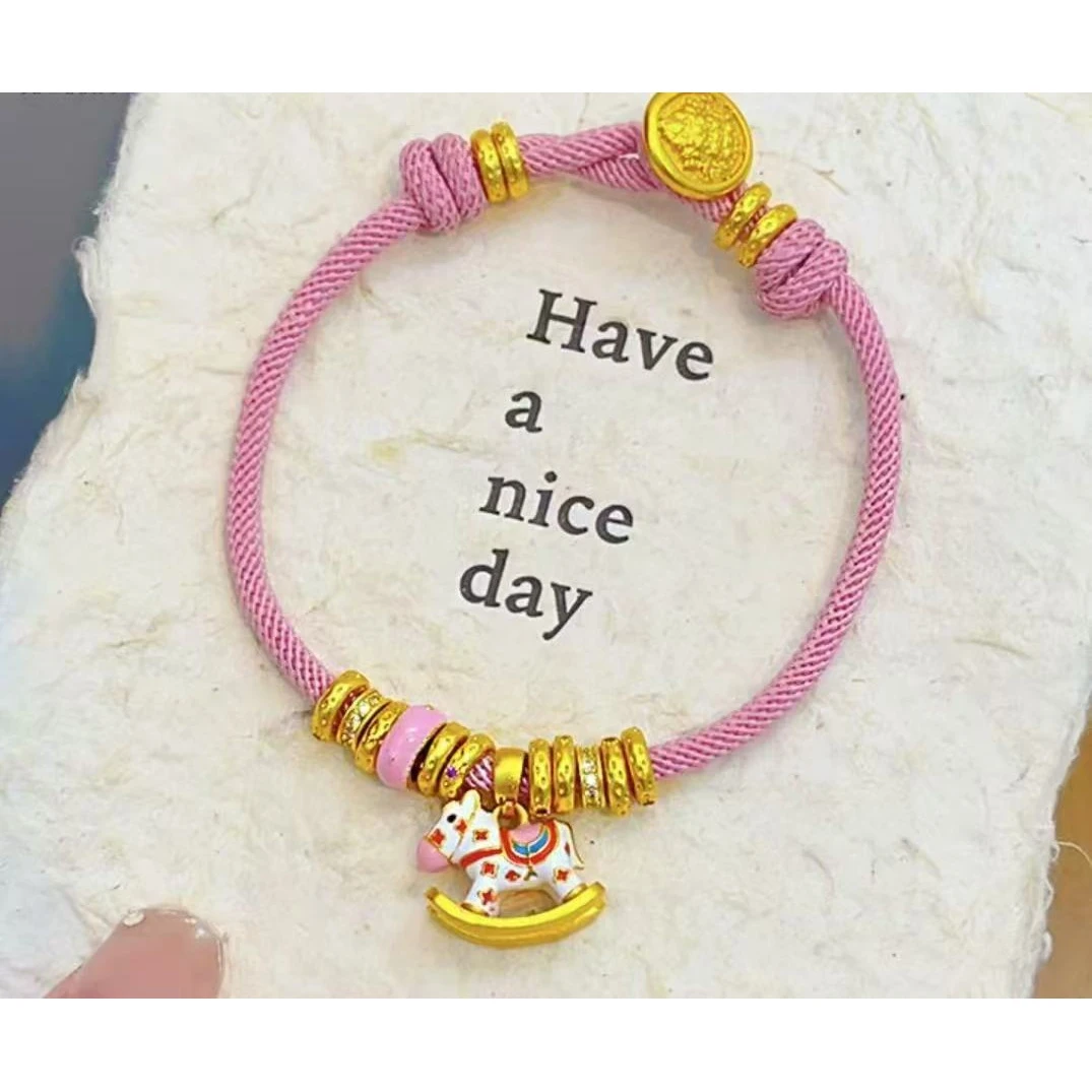 铜合金手链 新款多巴胺白色旋转木马2025春季爆款盘缠铜镀K金手链