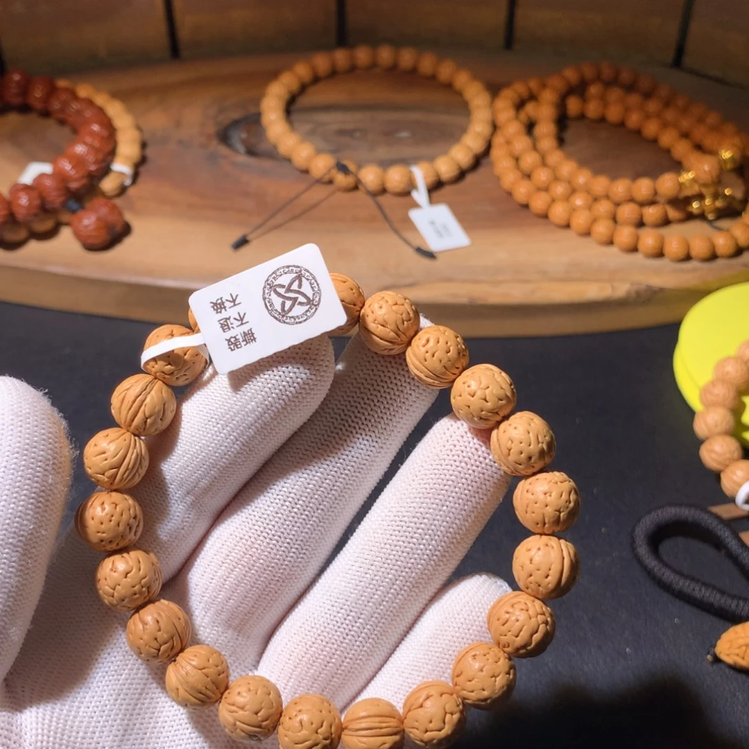 珞***一手串桃核东北小肌肉