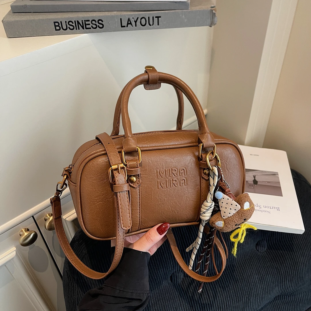 高级感复古保龄球包包女2025秋冬新款小众手提包时尚通勤斜挎包