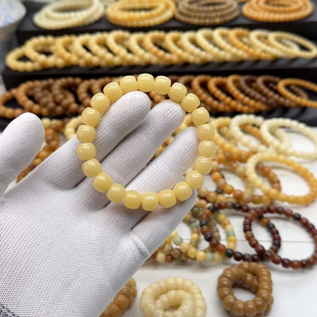 菩提根/象牙果手串10*11鼓珠 精工10年