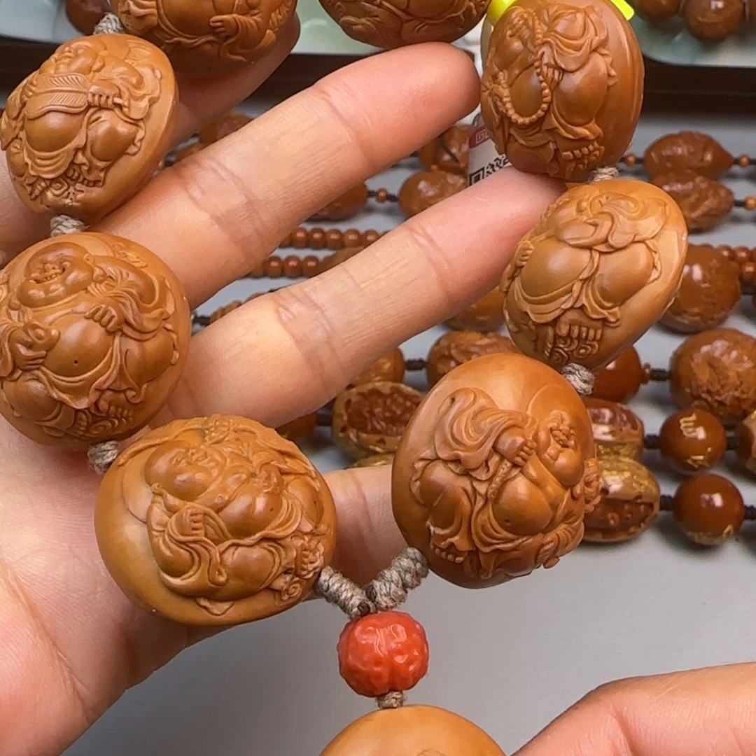 橄榄核手串/手链2.6尺寸四花牌浮雕八宝弥勒