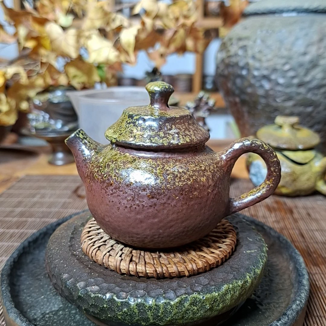 坭兴陶纯柴烧锤纹杯110c，微瑕
