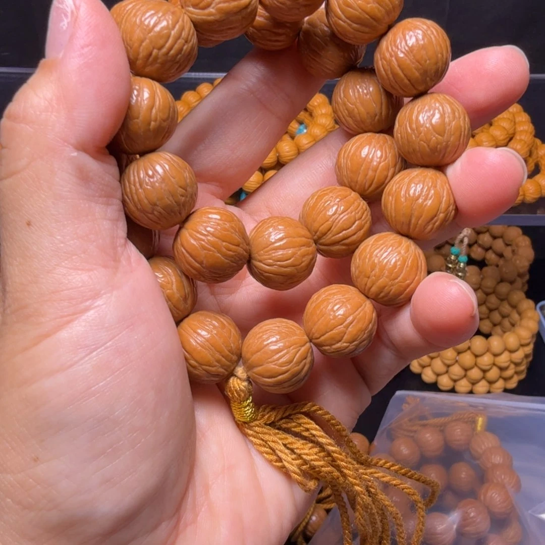 猴头核桃吊坠凤羽手持26颗籽