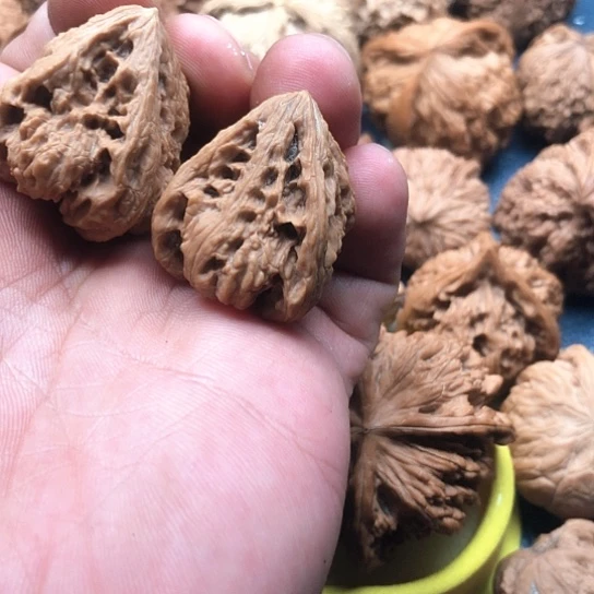 G***K文玩核桃吊坠南疆石佛肚一对