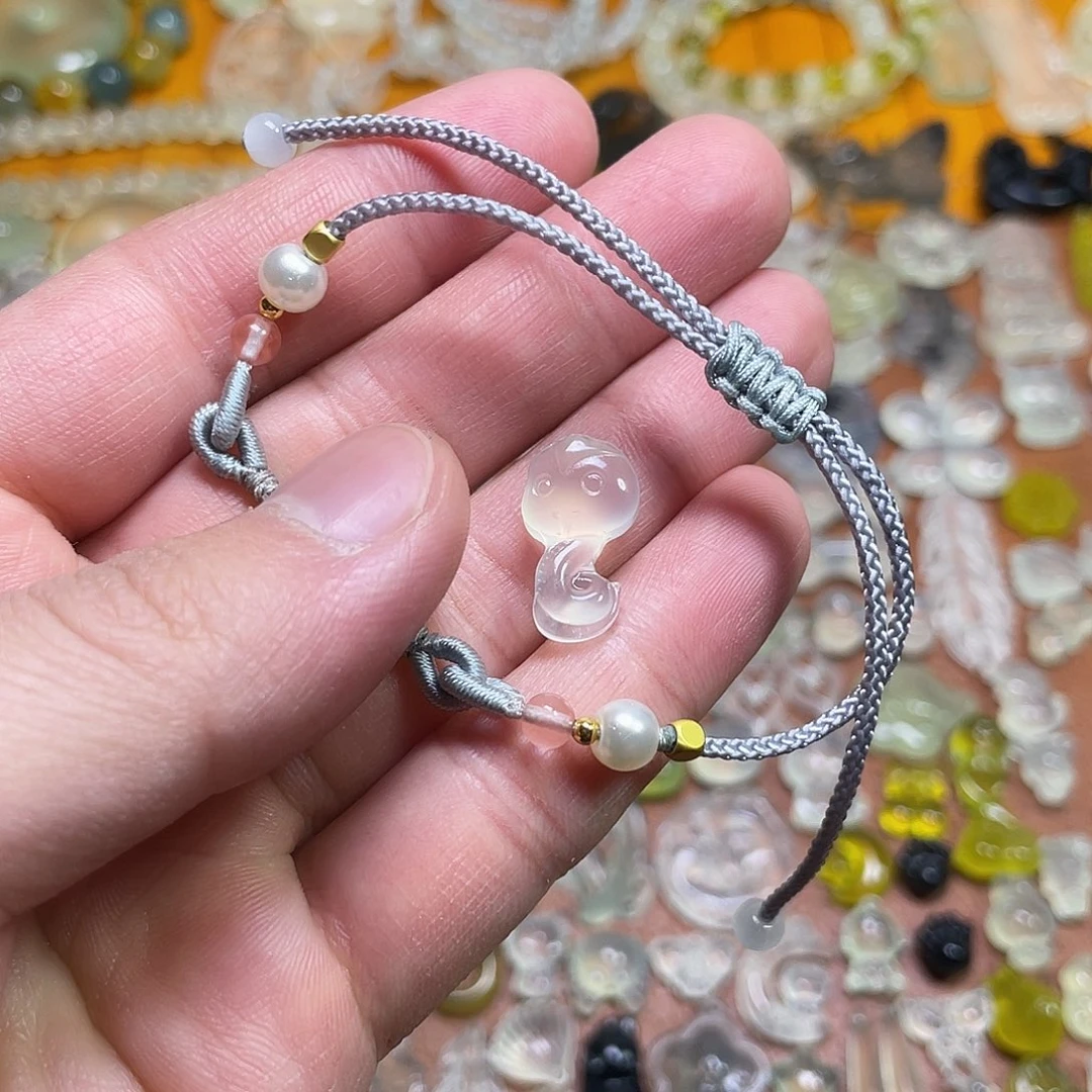 蛇纹石玉吊坠未镶嵌包*子