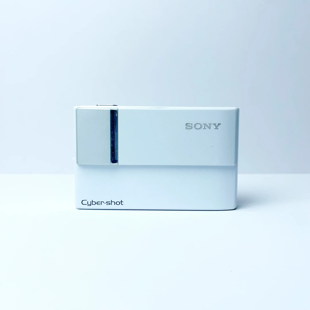 9新 Sony/索尼 t10奶白色 色彩好720万像素滑盖机ccd自备读卡器