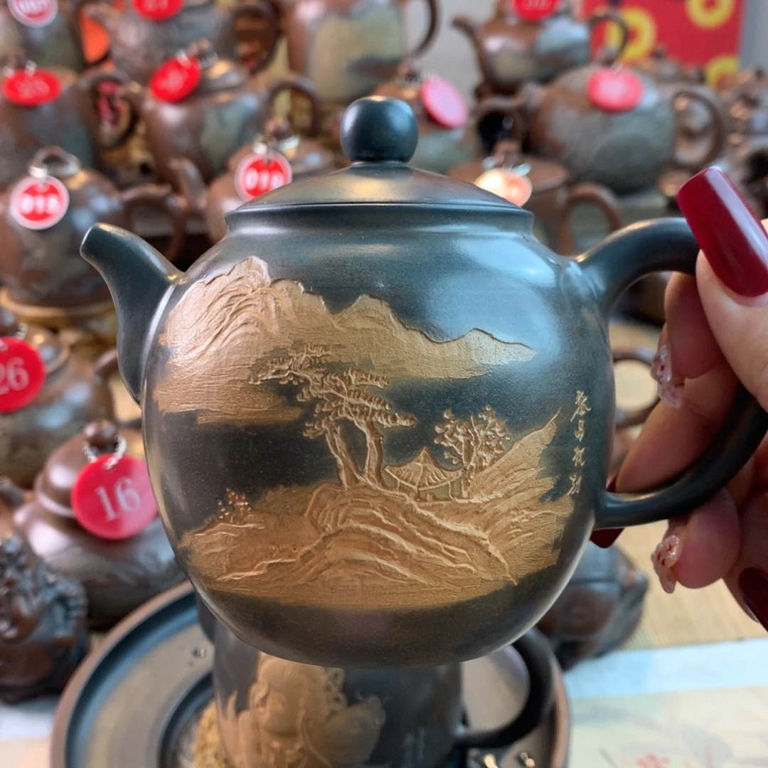 长*弓黎昌权浮雕富桶壶