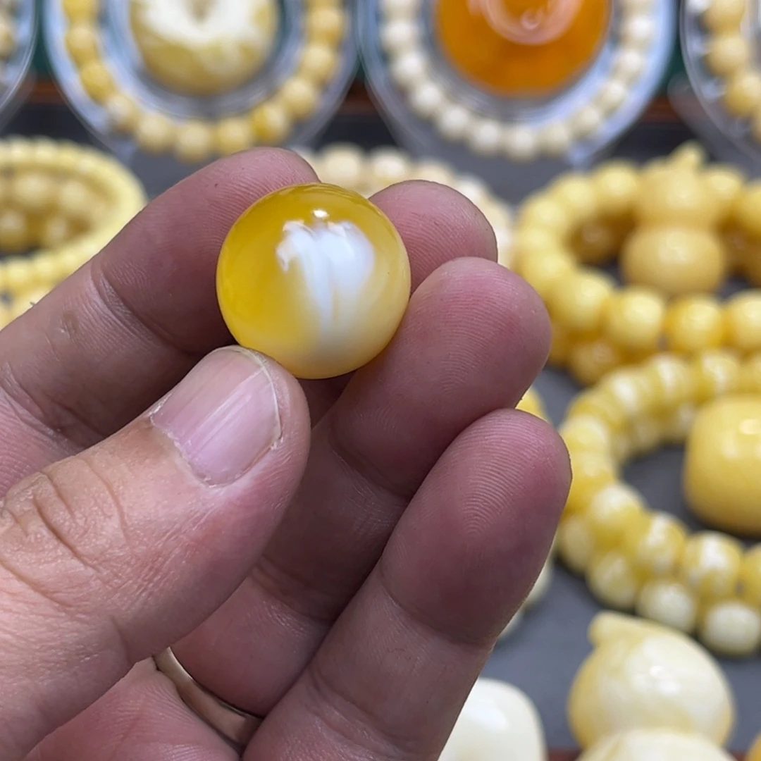 百***业琥珀未镶嵌手串圆珠19.3mm，打孔不退不换