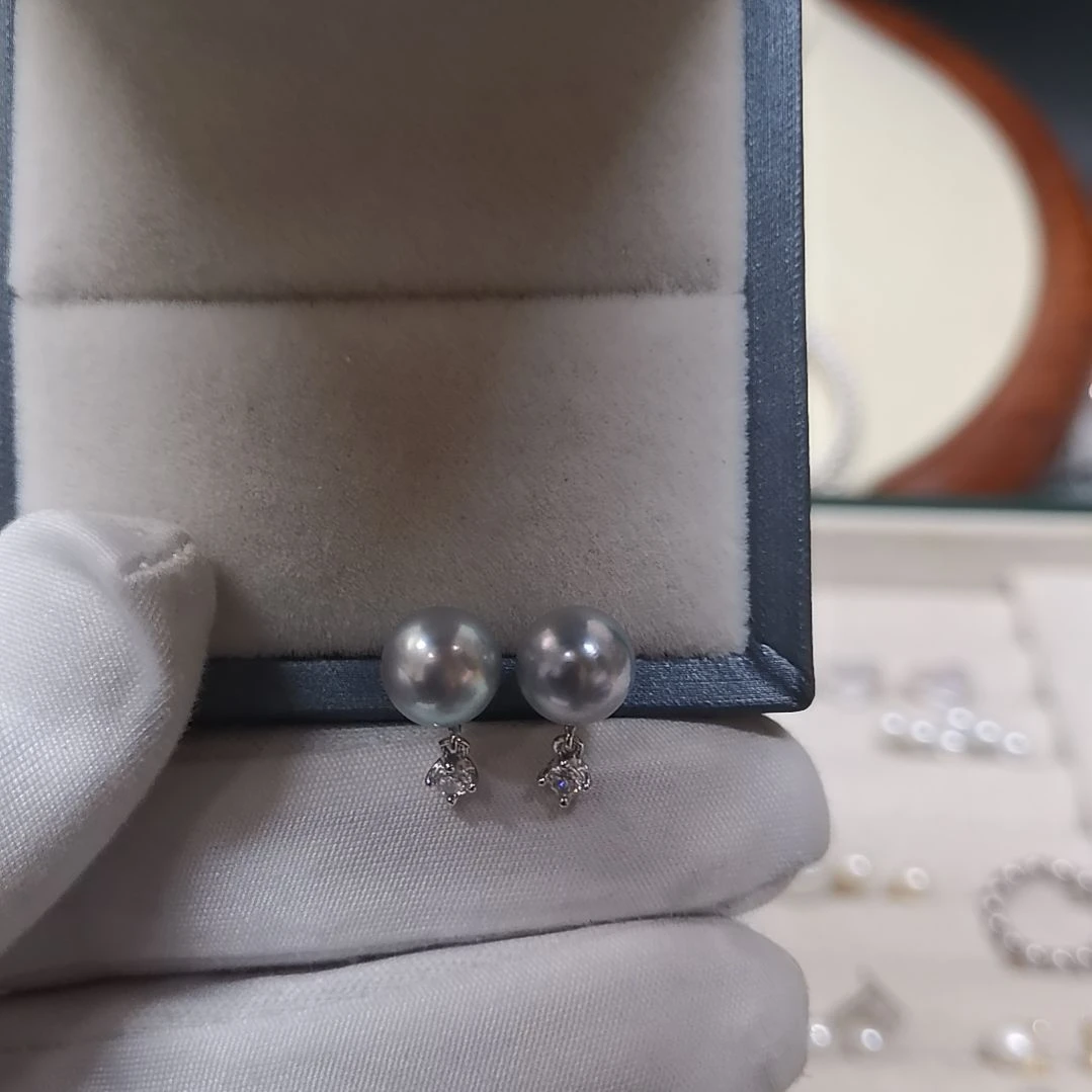 麦***兜海水珍珠银S925镶嵌耳饰