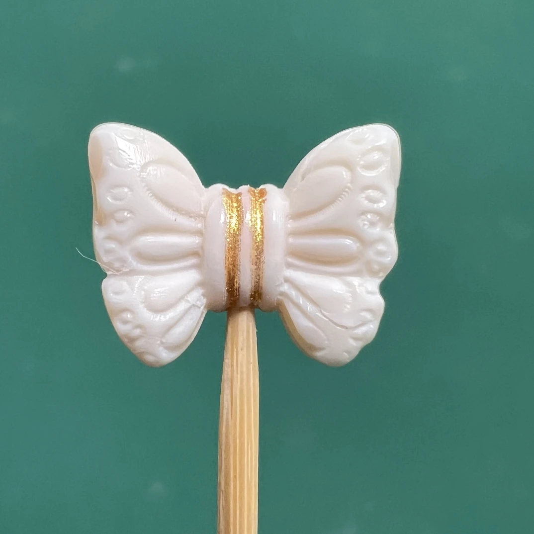 天然猛犸象牙蝴蝶结约10×13支持鉴定假一罚四