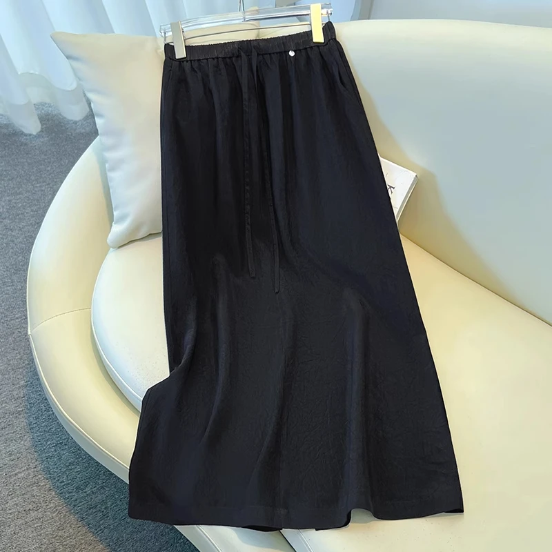 拉夏贝尔黑色醋酸缎面半身裙女夏季2025新款月光包臀裙直筒a字裙